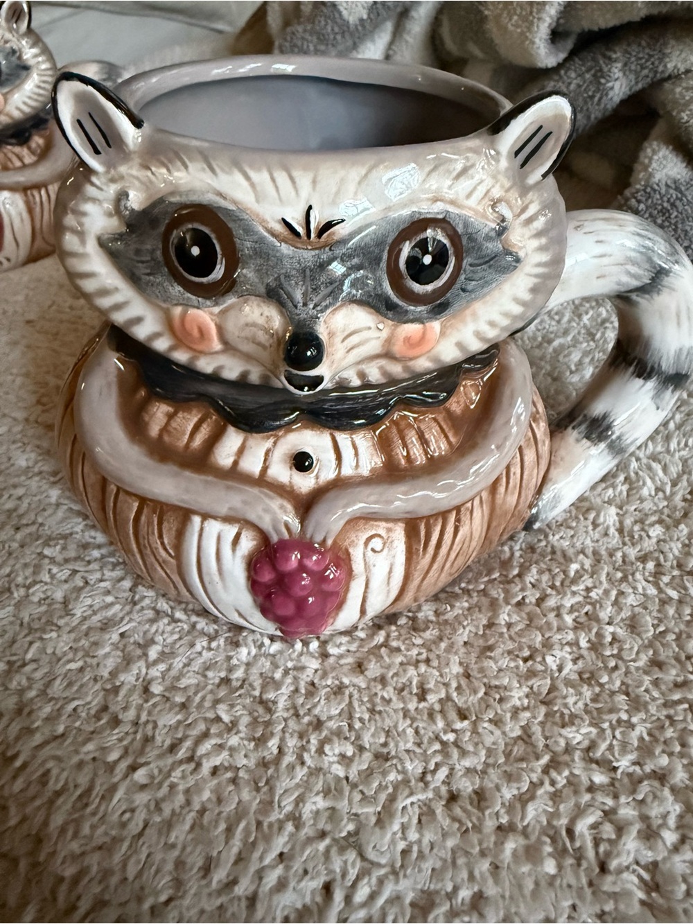 Johanna Parker Whimsical Raccoon Ceramic Mug in Beige, Gray and Pink